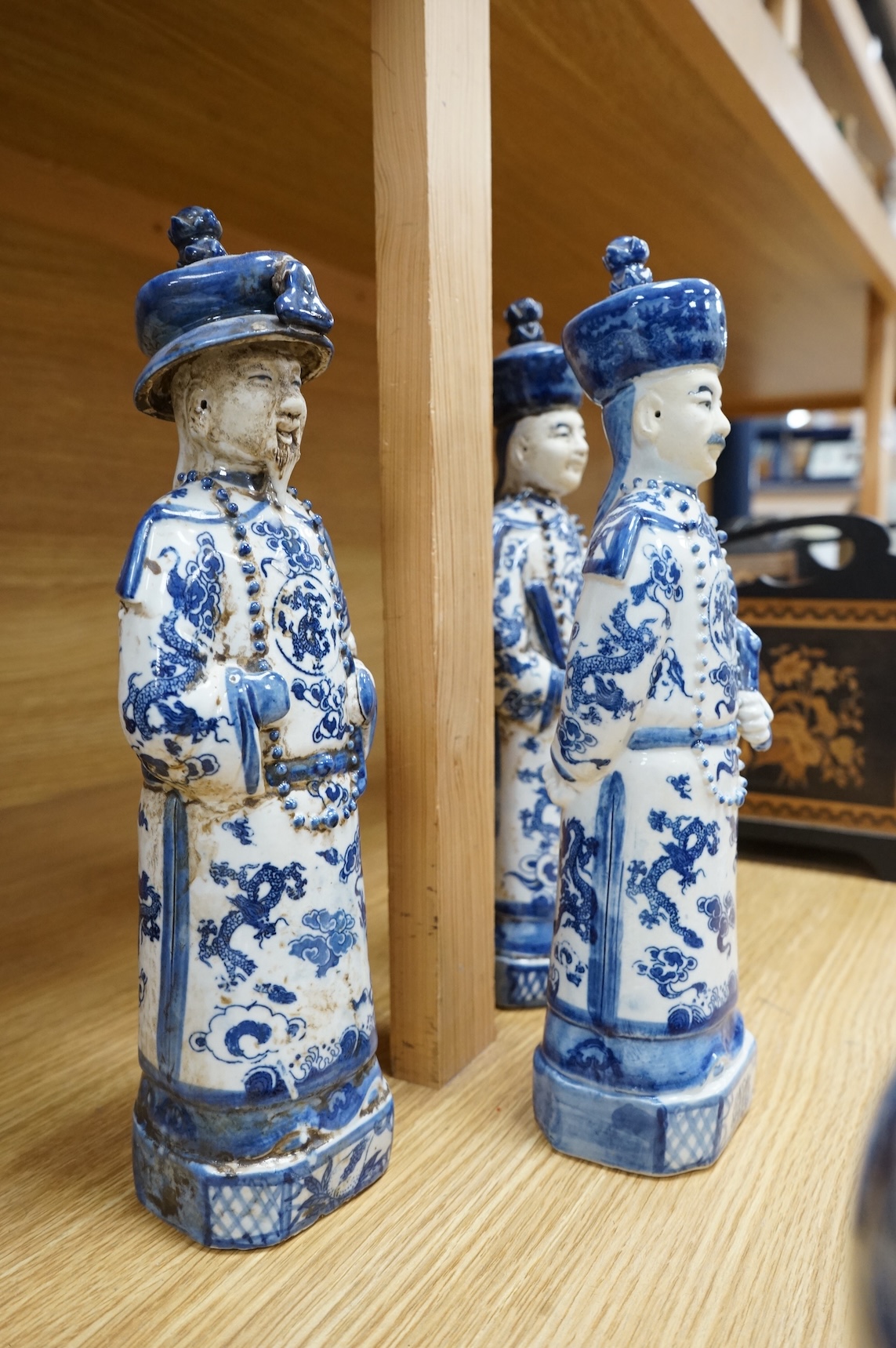 Three Chinese blue and white porcelain figures H 29cm x 9cm., and a Delft tobacco jar H 26cm W 18cm